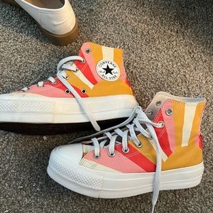 Pink, yellow, orange white sun converse.